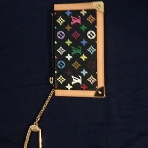 Louis Vuitton clutch and coin purse.